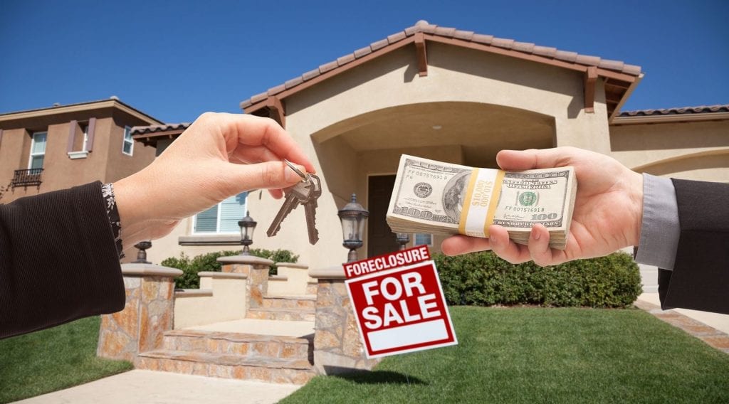 Should You Buy a House at a Foreclosure Auction? Mashvisor