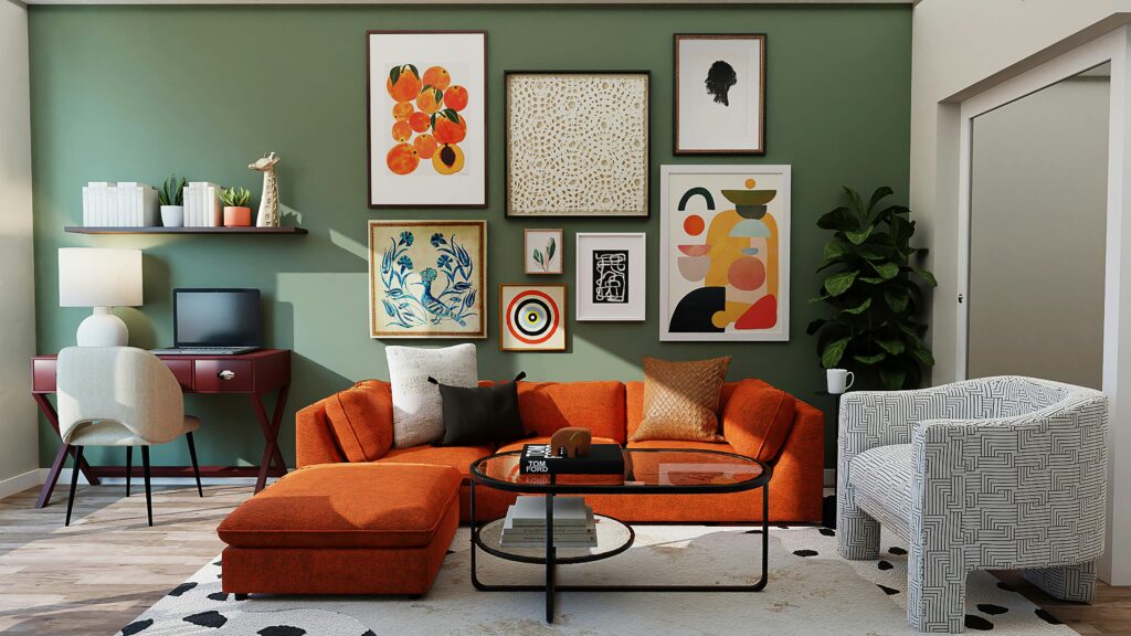 An orange couch with green wall and artwork. 